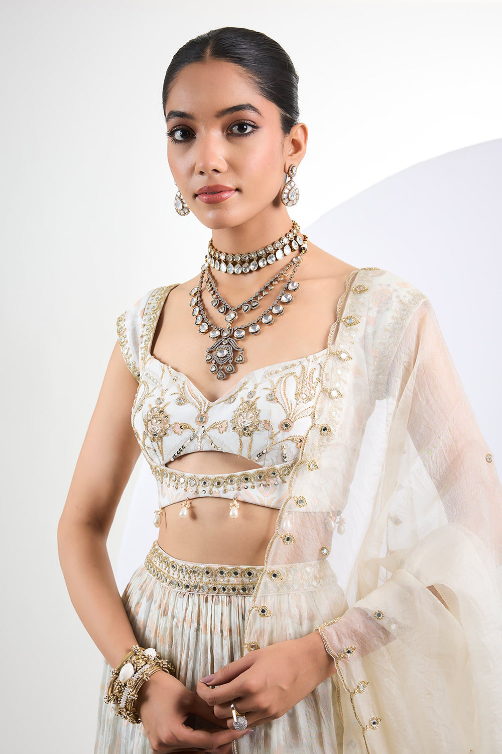 Printed chinon chiffon ivory lehenga set with pearl tassels and organza Dupatta