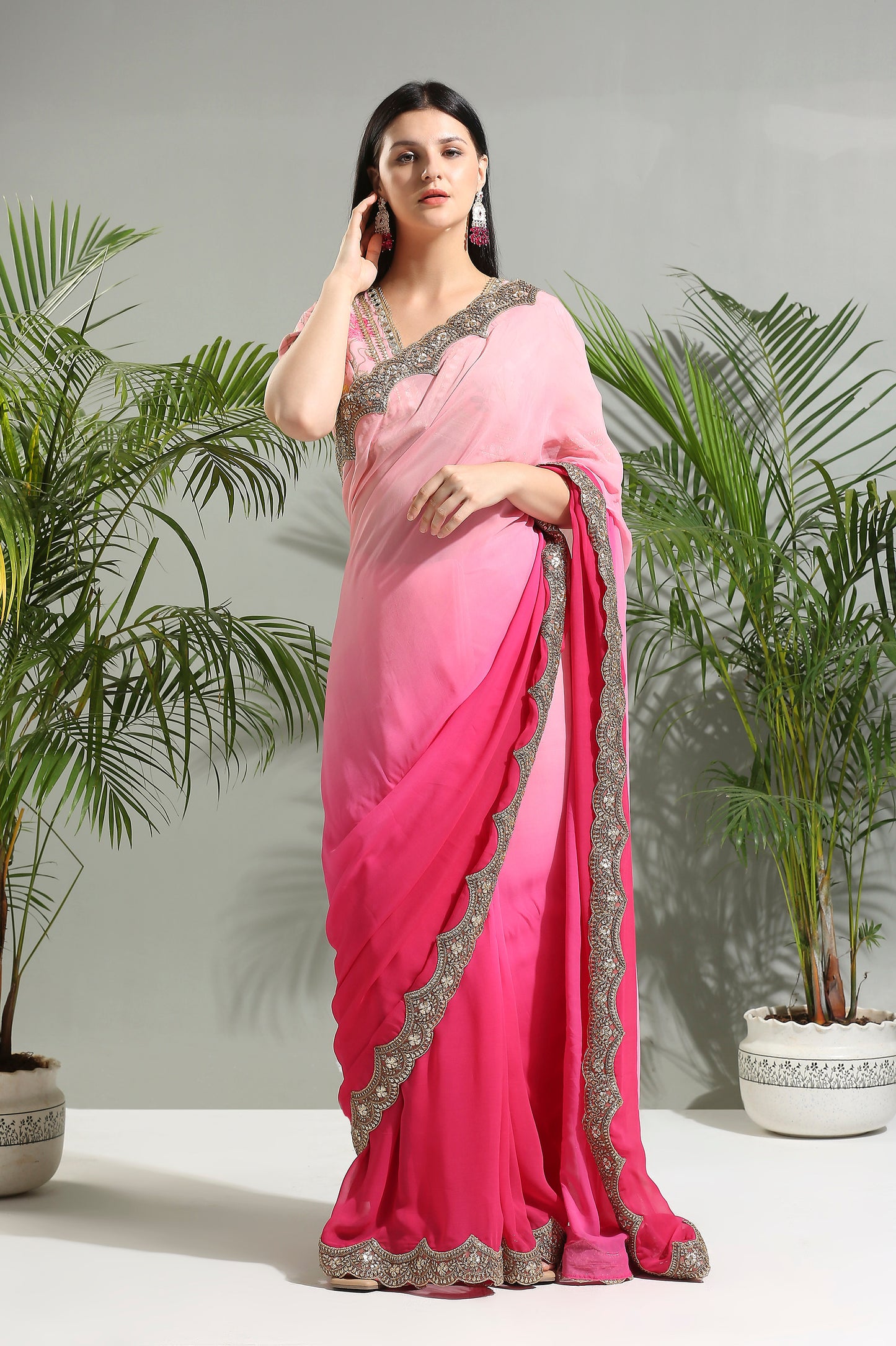 Pink shaded saree with floral blouse