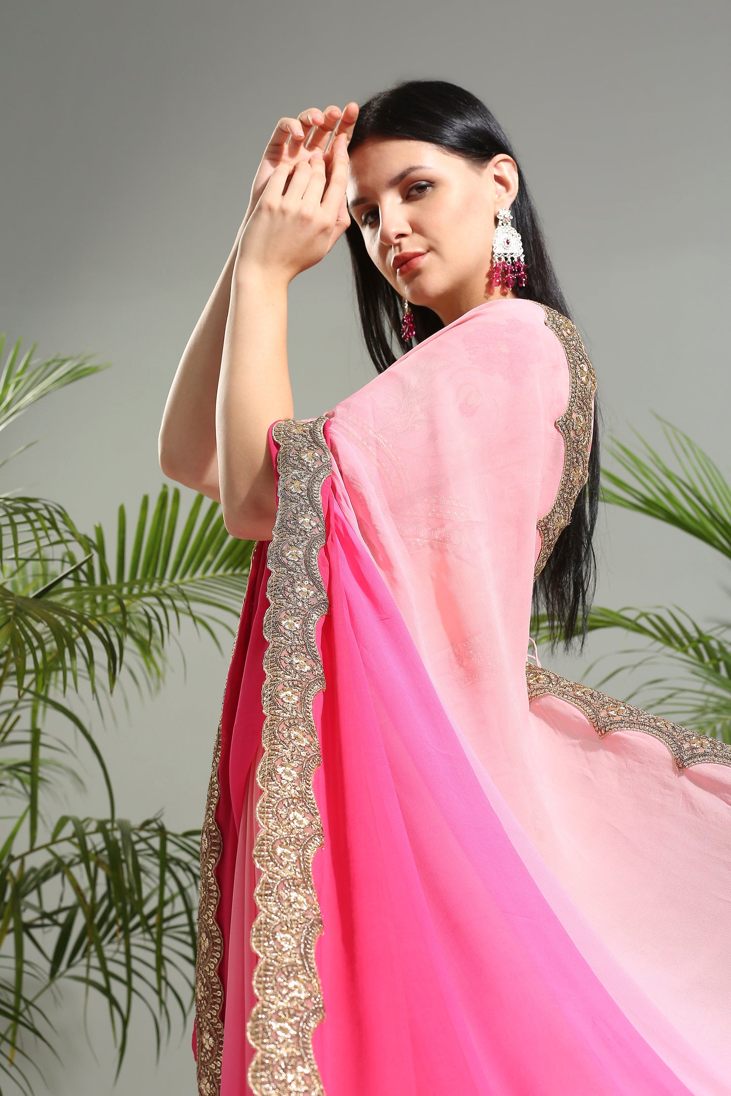 Pink shaded saree with floral blouse
