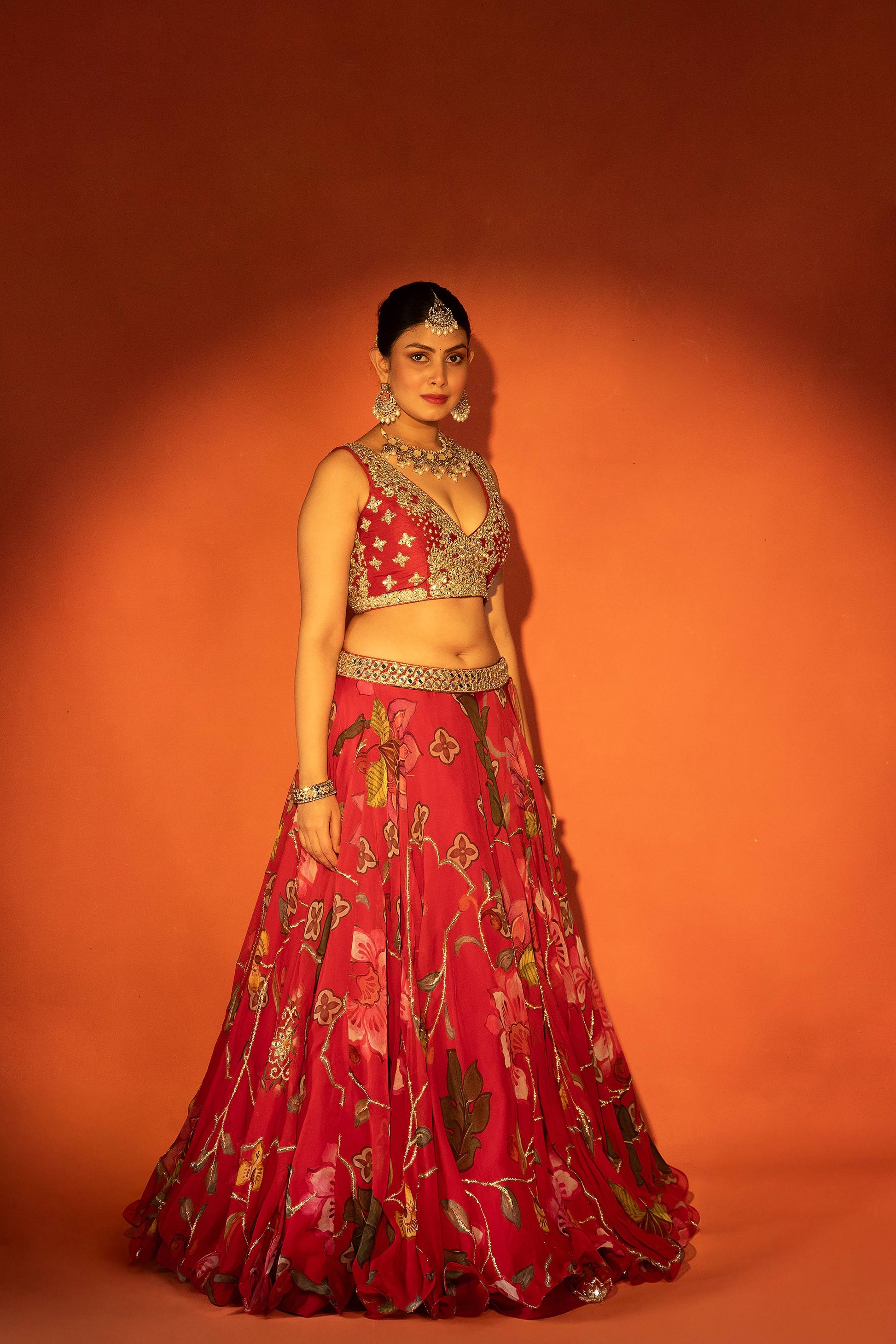 Red floral lehenga with mirror-work blouse and placement dupatta