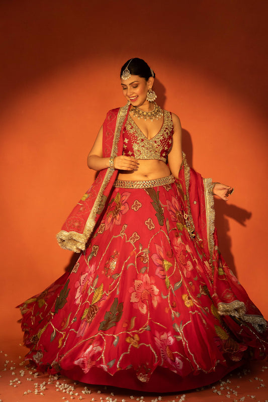 Red floral lehenga with mirror-work blouse and placement dupatta