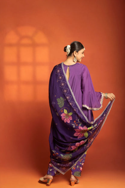 Purple Short Semi- Anarkali with a heavily Embroidered Neckline, Paired with Floral Printed Salwar Pants & Dupatta