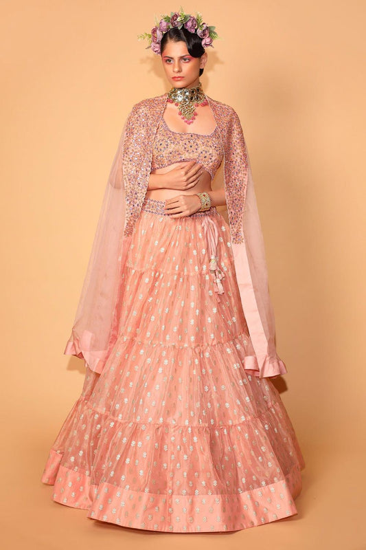 Peach Banarasi Organza Tiered Lehenga Set With Embroidered Cape